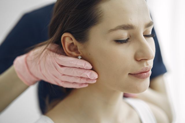 Restored earlobes after specialist repair